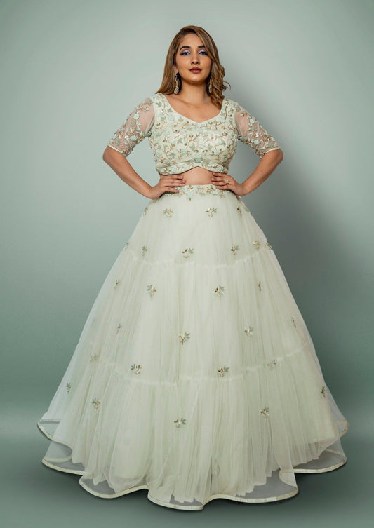 Sea Green Lehenga And A Crop Top Set In Floral Motifs Embroidery, Crafted In Net