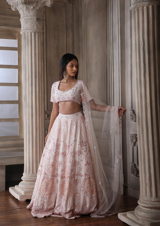Peach Lehenga Choli In Raw Silk With Hand Embroidered Work And A Matching Dupatta