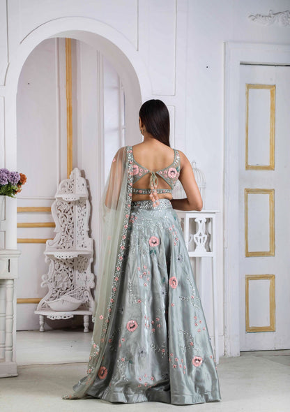 Tomilho Lehenga Choli In Glass Organza With Floral Handwork And A Matching Net Dupatta
