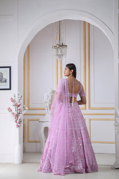 Lavender Lehenga Choli In Organza In Self And Silver Work With A Matching Net Dupatta