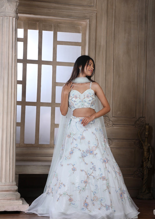 Light Pistachio Lehenga Choli With Multi Coloured Hand Embroidered Floral Buttis And Zaal Work