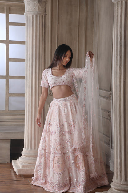Peach Lehenga Choli In Raw Silk With Hand Embroidered Work And A Matching Dupatta