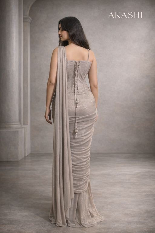 Silver grey simmer saree with corset blouse.