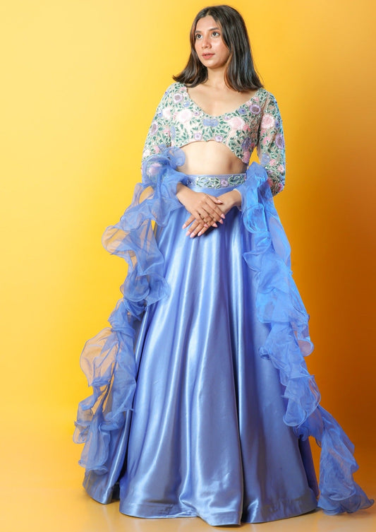 Blue Satin Lehenga And Blouse With Heavily Embroidered Colourful Spring Blooms