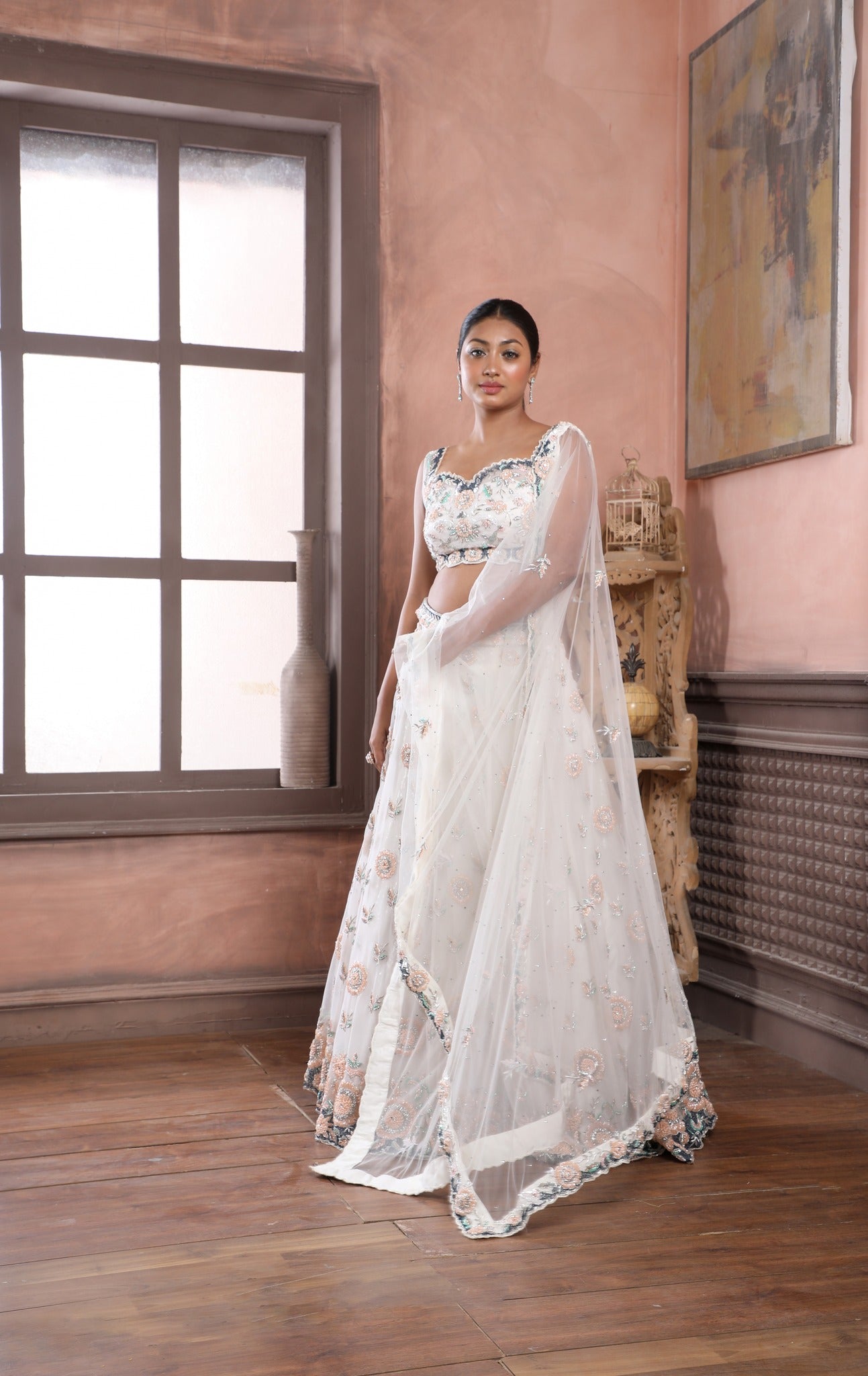 Off White Embroidered Lehenga with sweetheart neckline