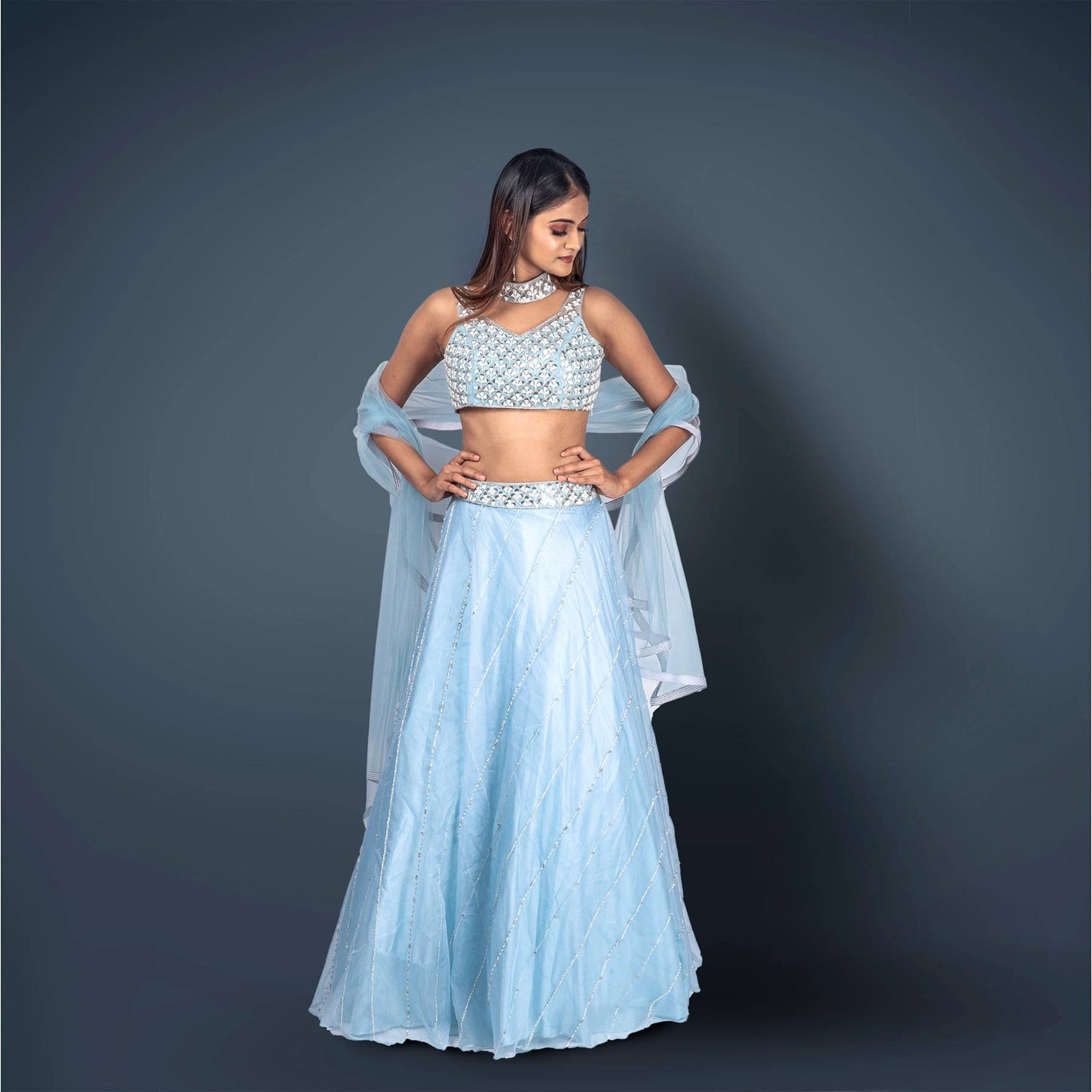 Creamy Blue Lehenga And Crop top Embellished With Pearl And Sali Work