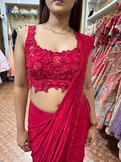 Red pleated saree