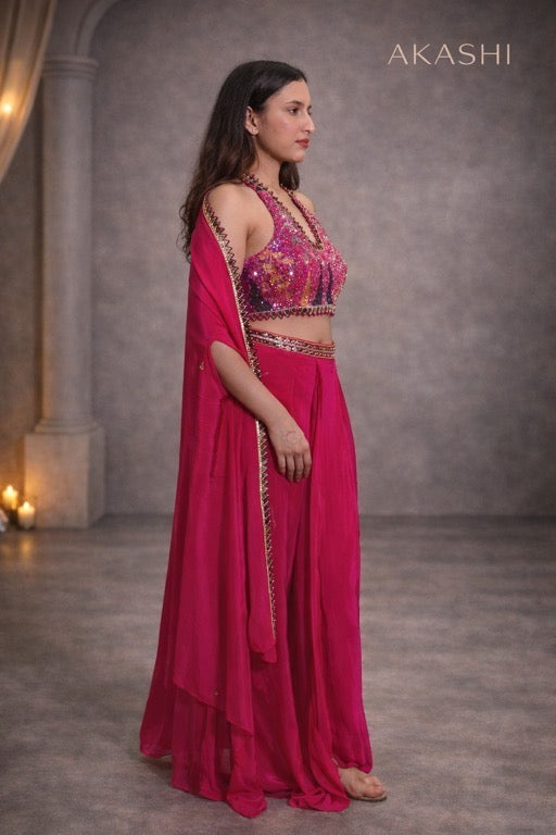Hot pink halter neck saree with hand work blouse