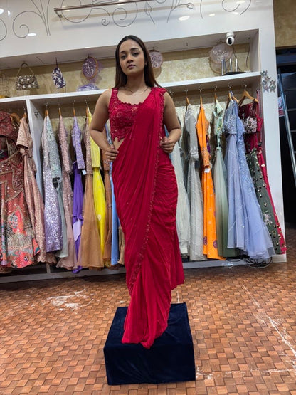 Red pleated saree