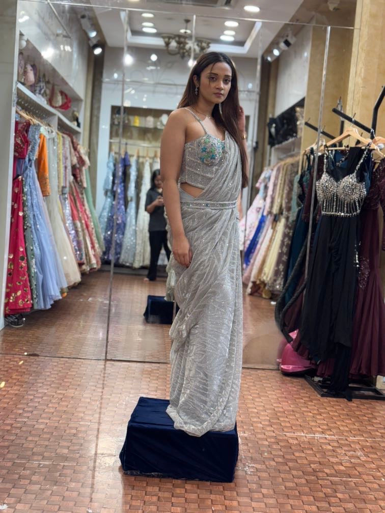 Simmering Silver pleated saree with corset blouse