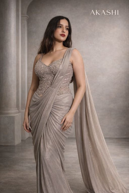 Silver grey simmer saree with corset blouse.