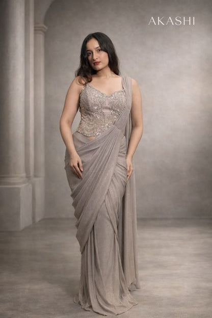 Silver grey simmer saree with corset blouse.