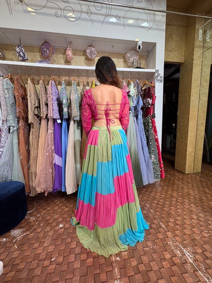 Fuchsia pink blouse with stylish lehenga