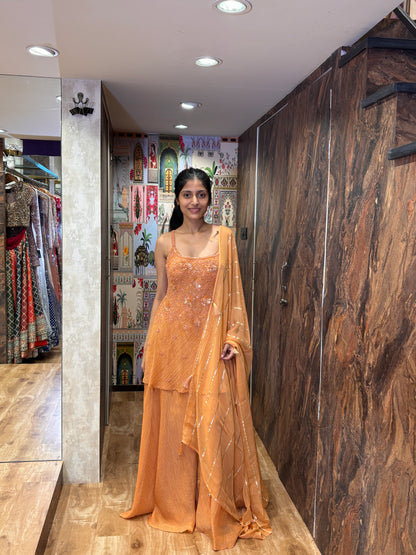 Sunset Peach plazo with a short kurti and dupatta