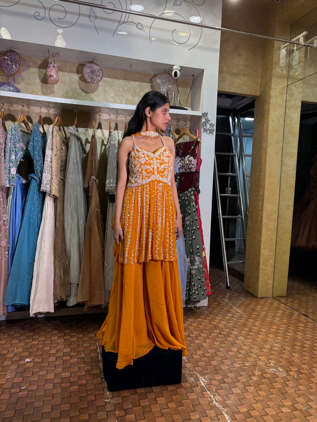 Orange colour plazo with peplum top