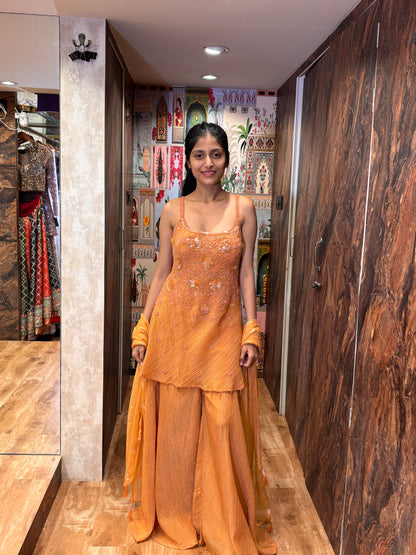 Sunset Peach plazo with a short kurti and dupatta
