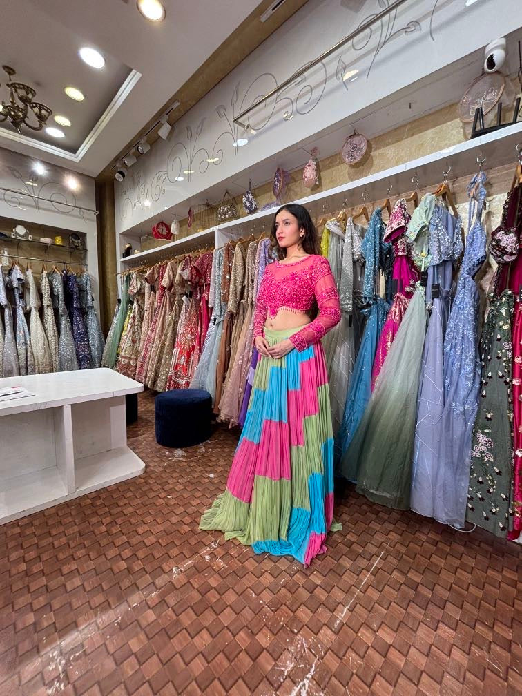 Fuchsia pink blouse with stylish lehenga