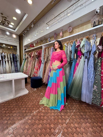 Fuchsia pink blouse with stylish lehenga