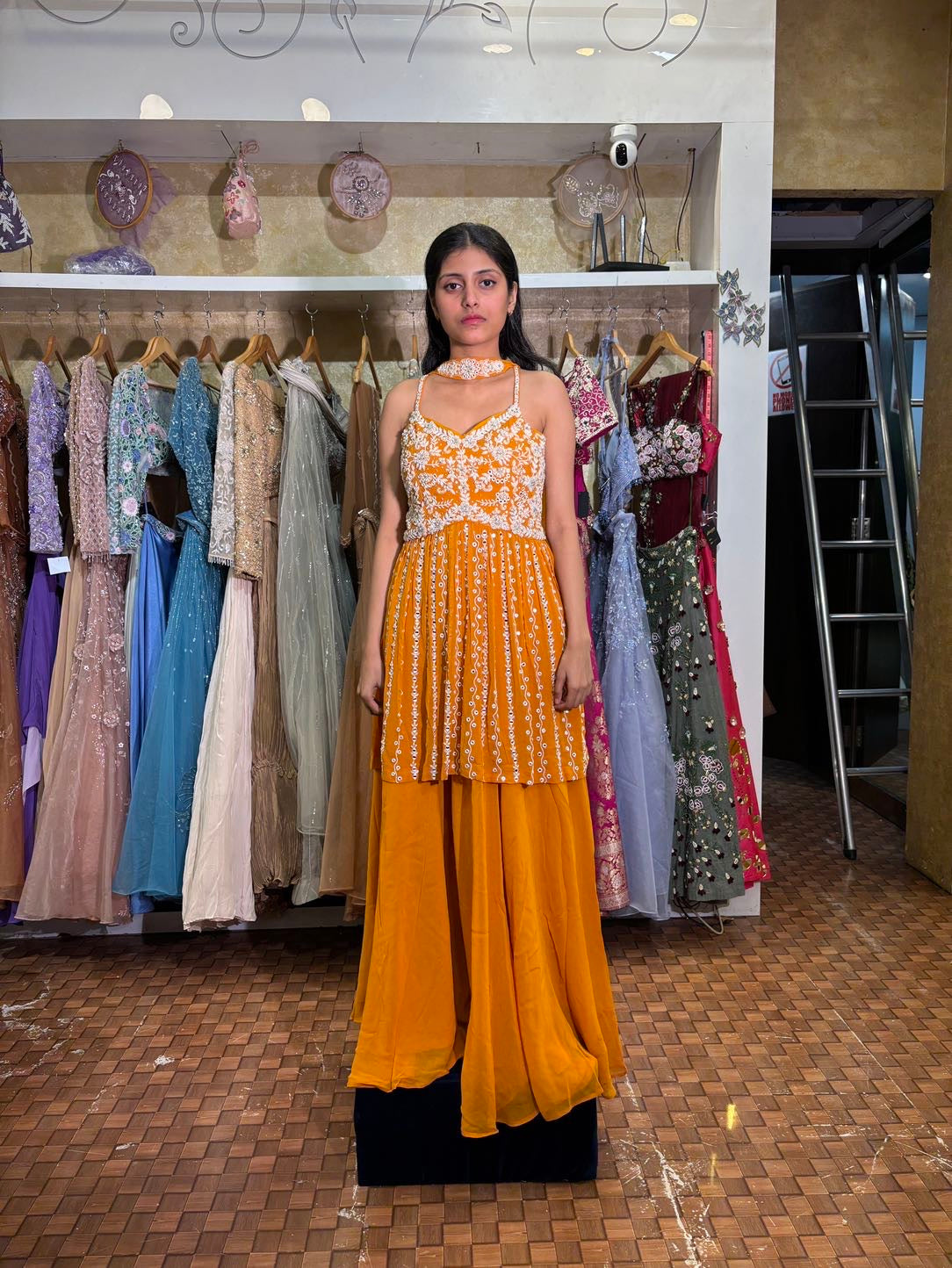 Orange colour plazo with peplum top