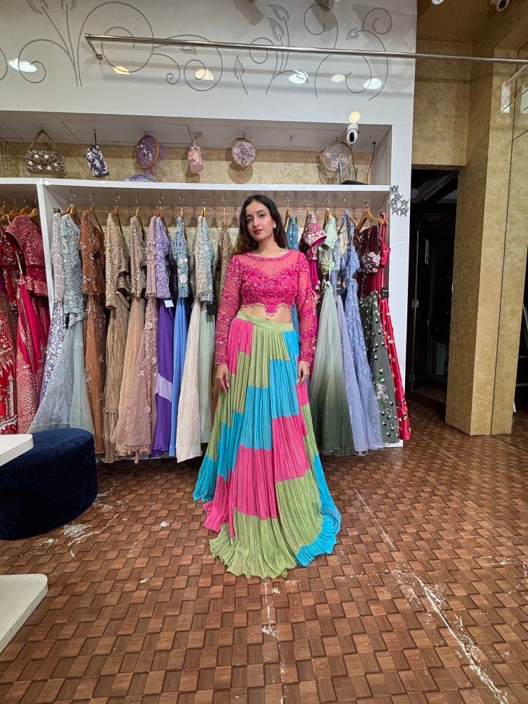 Fuchsia pink blouse with stylish lehenga