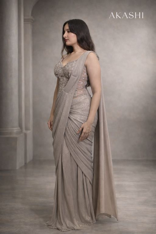 Silver grey simmer saree with corset blouse.