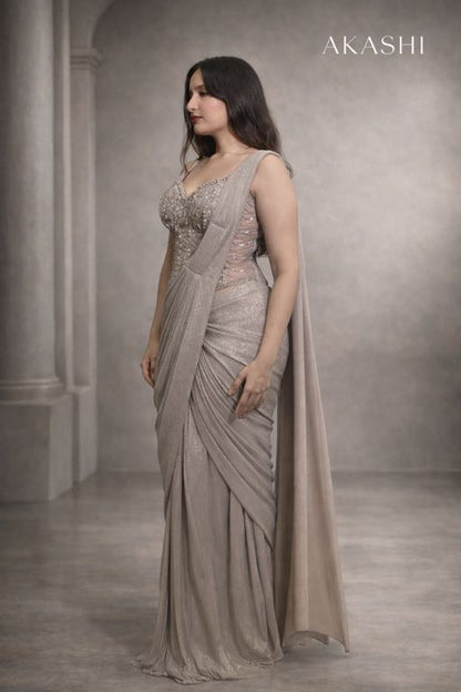 Silver grey simmer saree with corset blouse.