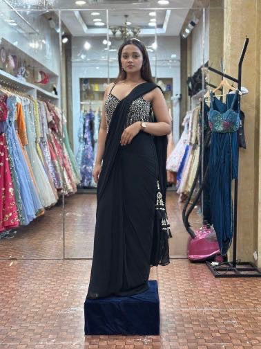Black saree with corset blouse